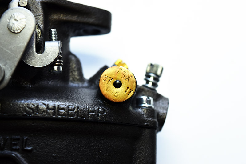 Typical round tag on a TSX carburetor
